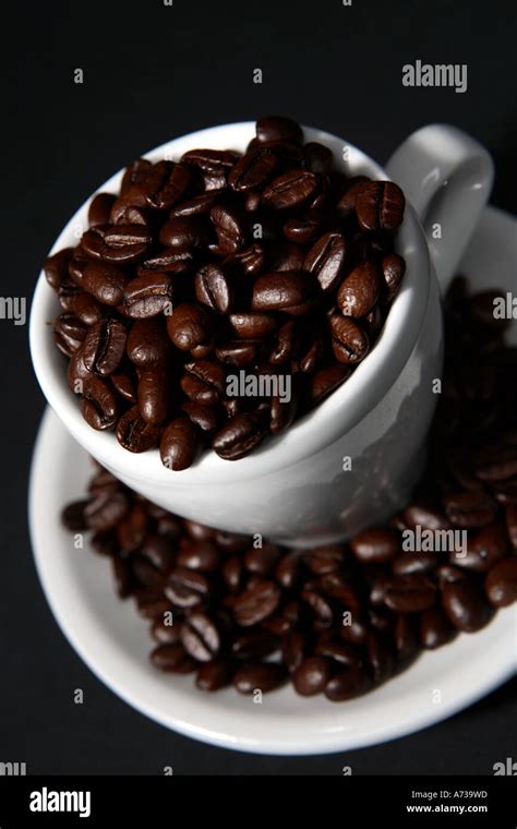 Organic Fairtrade Coffee Beans In A Cup Stock Photo Alamy