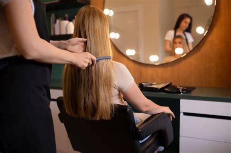 Free Photo Female Client Getting Her Hair Done At The Hairdresser