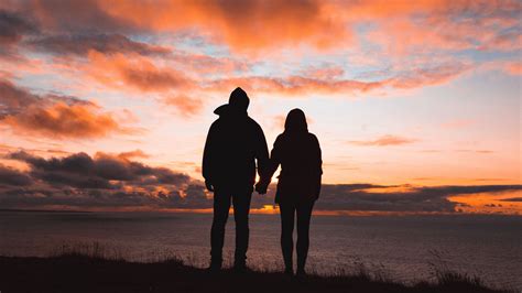 Couple Silhouettes Sunset Sky 4k Hd Wallpaper