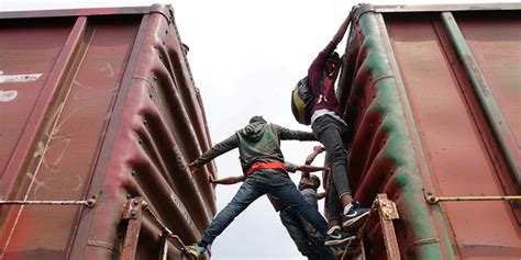 Hundreds of migrants board 'the Beast' train in Mexico in risky move to ...