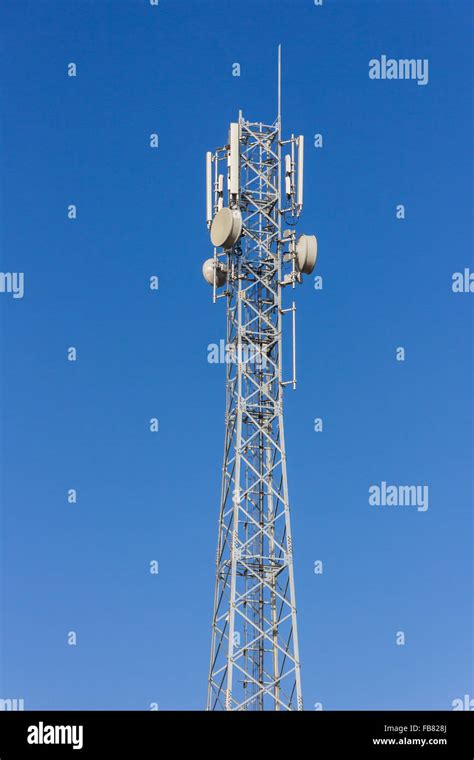 Telecommunication Tower With Antennas With Blue Sky Stock Photo Alamy