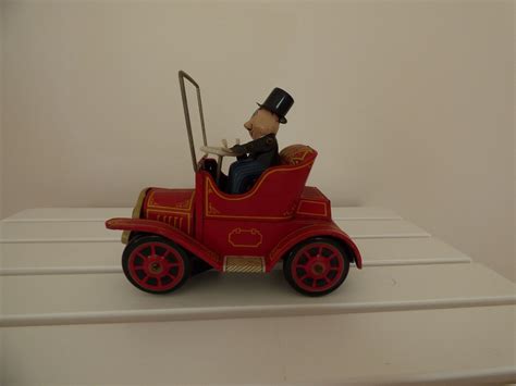 Vintage Metal Wind-up Toy Car -- Antique Price Guide Details Page