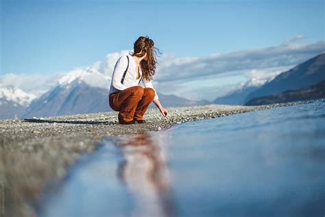 «woman At Lake Del Colaborador De Stocksy «simone Wave Stocksy