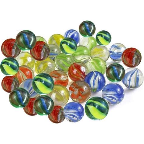 circuit de bille marbre verre colore oeil chat blanc livre dans