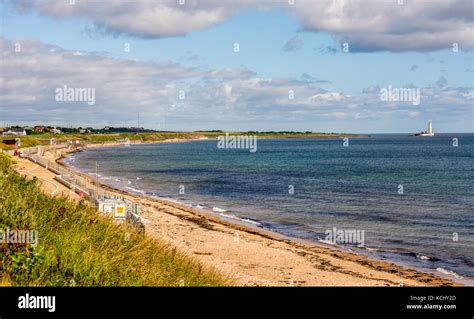 Whitley Bay Beach And A Lighthouse In A Background In A Summer Day