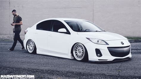 White Eyed Sedan – Mazda Fitment