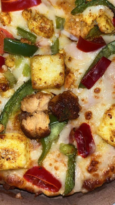 Dominos Delivered A Vegetarian Pizza With Pieces Of Chicken In It R