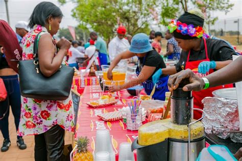 Diverse African Vendors Cooking And Serving Various Bread Based Street