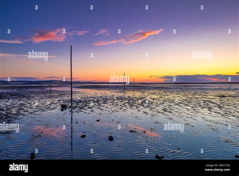 Sunset In Summer Over The Pilgrim S Causeway On The Holy Island Of