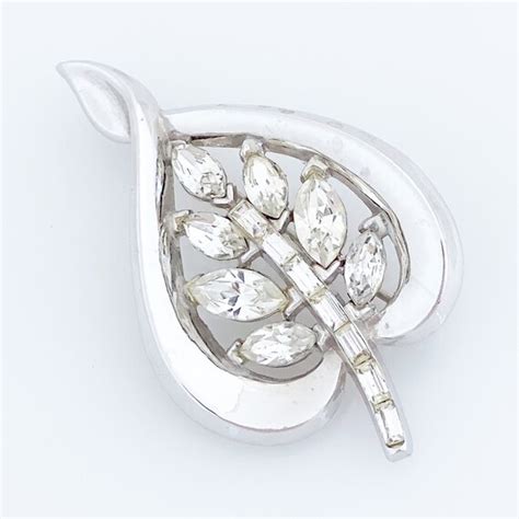 Platinum Trifarium Leaf Brooch With Navettes And Bagu Gem