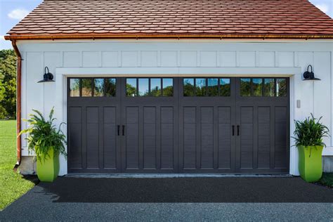 Clopay Coachman Collection Carriage House Garage Door On A White