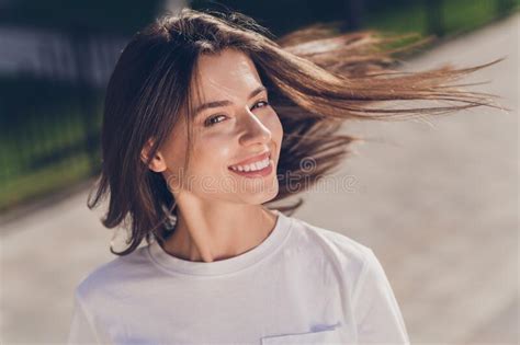 Photo Of Optimistic Brunette Lady Air Blow Wear White Cloth Walking In