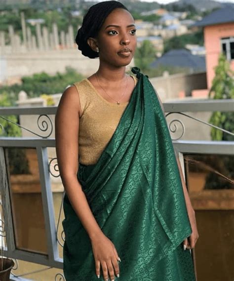 Clipkulture Burundian Bride In Green And Gold Imvutano Traditional Attire