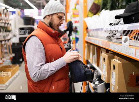 Hardware Store Customer Chooses Reliable Safety Boots Stock Photo Alamy