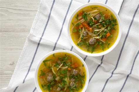 Homemade Sopa A La Minuta In White Bowls On A White Wooden Surface Top