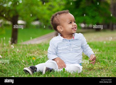 Portrait Of A Black African American Baby Boy Playing In The Park