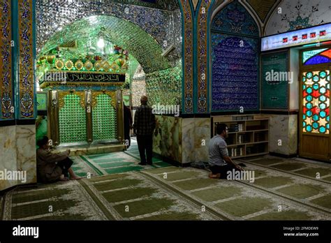 Praying Men In The Holy Shrine Of Imamzadeh Hilal Ibn Ali Or Blue