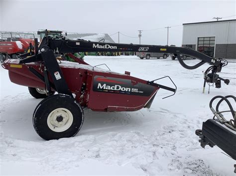 2007 MacDon R80 Rotary Disc Pull Type Windrower BigIron Auctions