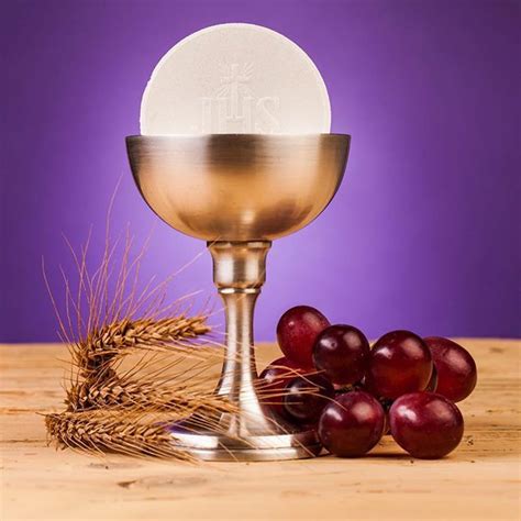 Host And Chalice With Wheat And Grapes© Mariuszszczygielgetty