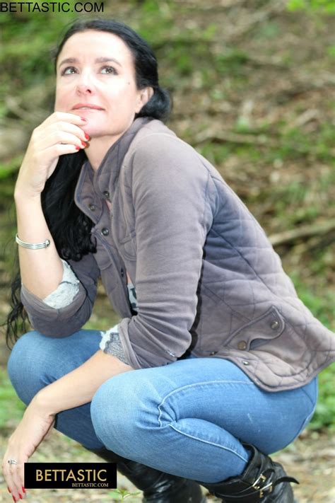 Gorgeous Brunette Babe Poses In Her Clothes Outdoors Photos