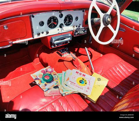 1960 Jaguar XK150 interior with record player Stock Photo - Alamy