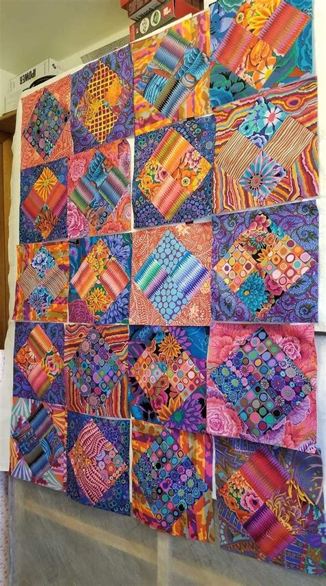 Colorful Quilt Hanging On Wall