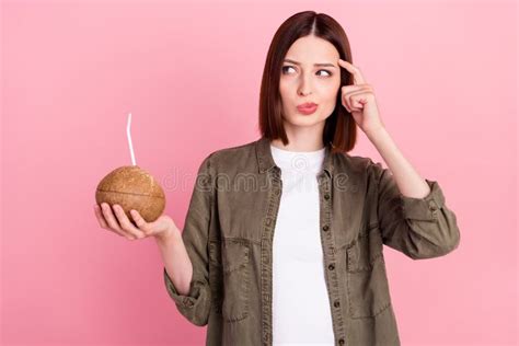 Photo Of Thinking Brunette Hairdo Millennial Lady Drink Cocktail Look Empty Space Wear Khaki