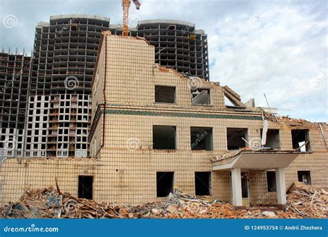 Old Demolished House And Construction Of New High Rise Residential