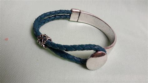 Bracelet bi matière en métal argenté et cuir tressé bleu vert