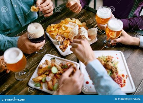 Men Drinking Beer And Eating Food Closeup Stock Image Image Of Snacks Food 118330243