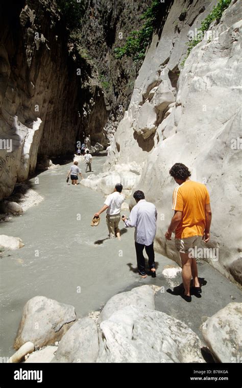 Hikers In The Saklikent Canyon Esen Cay River Gorge Rock Canyon In