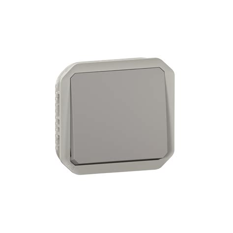 Poussoir NO étanche Plexo 10A IP55 IK08 avec enjoliveur finition gris