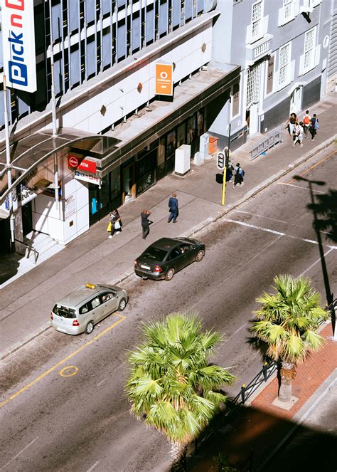 street scene buildings cars tank top