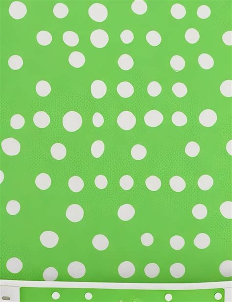 Premium AI Image | Green polka dot fabric texture with white polka dots on it