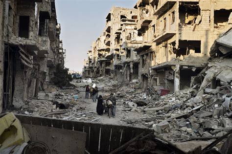 City Of Devastation Syrians Return To Hellish Scenes In Homs Time