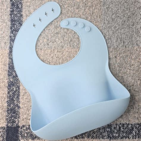 MINIKOIOI BAVOIR EN SILICONE AVEC POCHE RECUPERATRICE BLEU REF