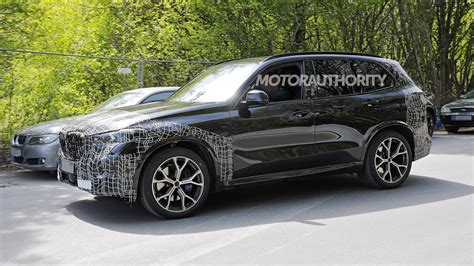 2023 Bmw X5 Spy Shots And Video Mild Facelift Pegged For Popular Suv