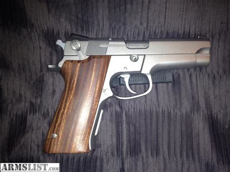 ARMSLIST - For Sale: S&W 5906 9mm w/ hogue wood grips