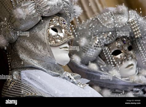 Portrait Of A Two People Dressed In Carnival Costume And Mask Venice