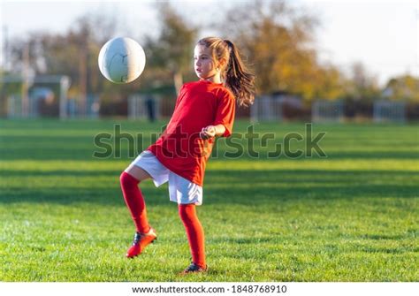 Girl Kicks Soccer Ball On Soccer Stock Photo Edit Now