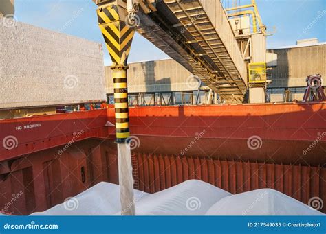 Loading Bulk Cargo into the Hold of a Bulk Carrier in the Port Stock ...