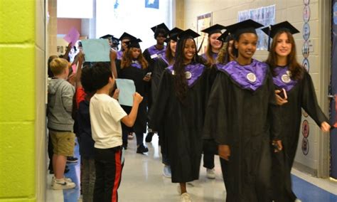 Guilford County seniors celebrate graduation with elementary students