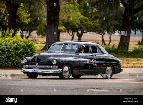 A 1949 Mercury Sedan Arrives At The American Graffiti Charity Car Show