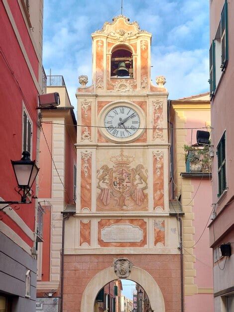 Premium Photo Clock Tower In The Old Town Of Loano Village On The