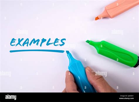 Examples. Text on a white background. Colored markers Stock Photo - Alamy