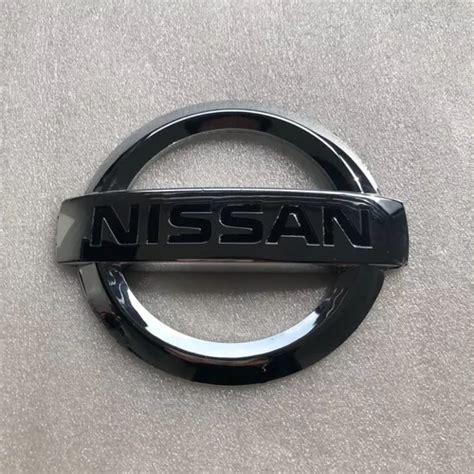 Emblema Trasero Nissan March Hm A