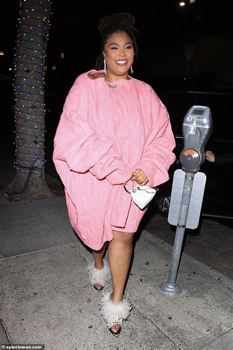 Lizzo Puts On A Stylish Display In Bright Pink Sweater Dress As She Steps Out For Dinner With