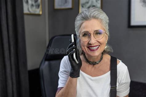 Smiling Mature Good Looking Woman Having A Call Stock Photo Image Of
