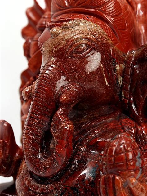 Chaturbhuja Lord Ganesha Seated On Lotus Red Jasper Stone Statue