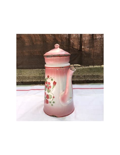 Ancienne cafetière en tôle émaillée rose et blanche décor floral